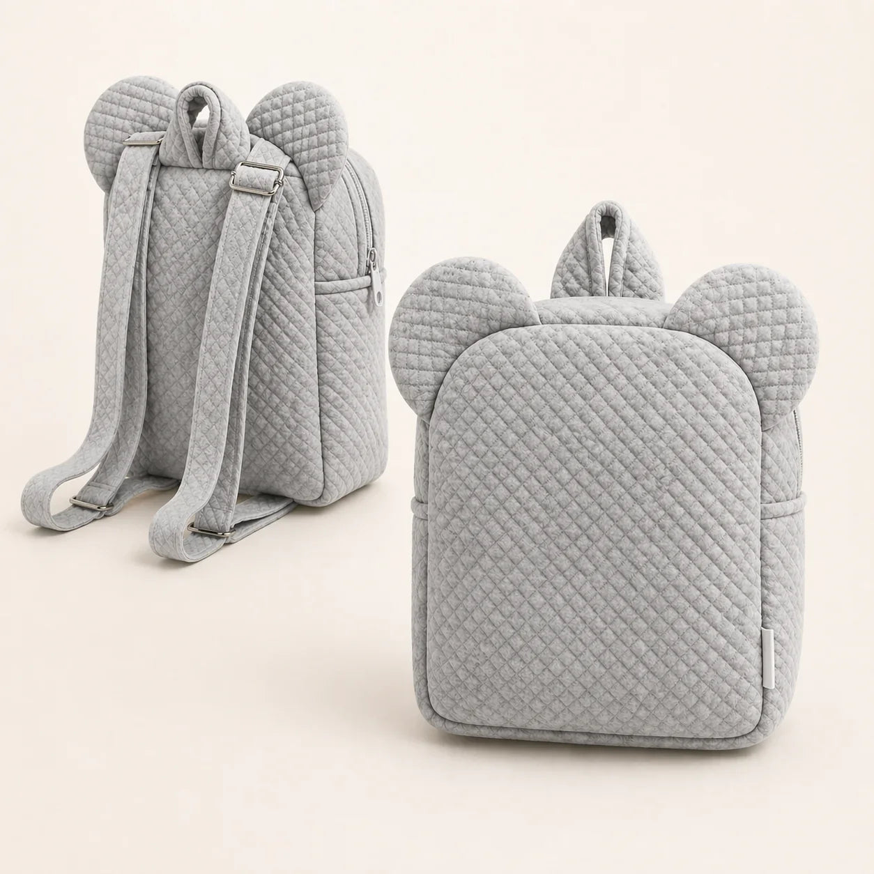 Mochila infantil cinza acolchoada com orelhas, ideal para bebé, estilo confortável e divertido.