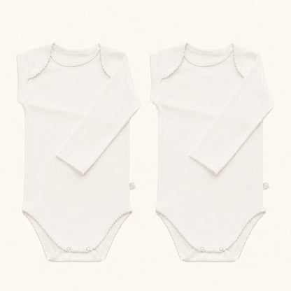 ​2 Bodies cava americana para bebé em 100% algodão Interlock bege. Sem etiquetas no decote, anti-pilling e ultra resistente