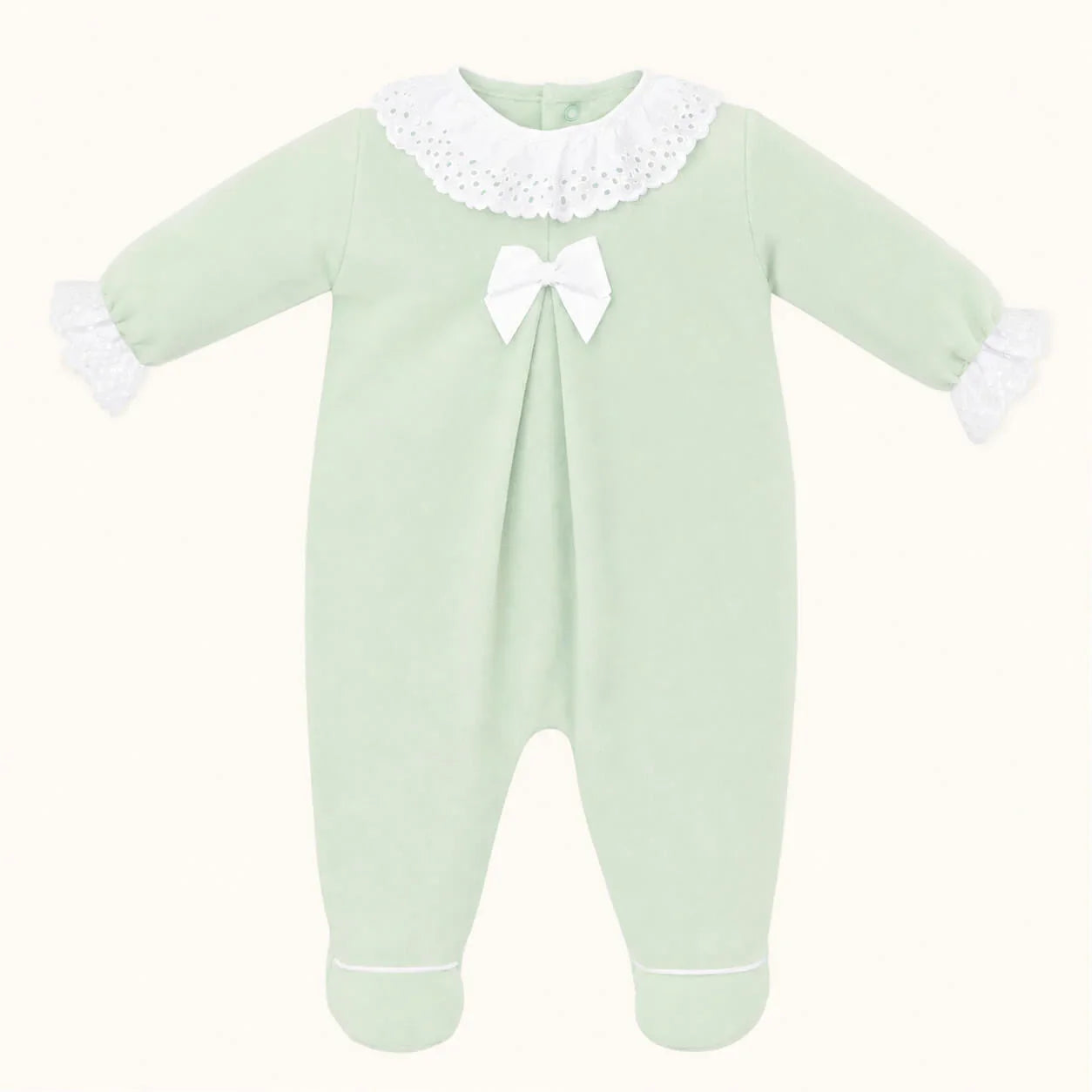 babygrow verde para bebé com gola de renda branca, laço e detalhes delicados