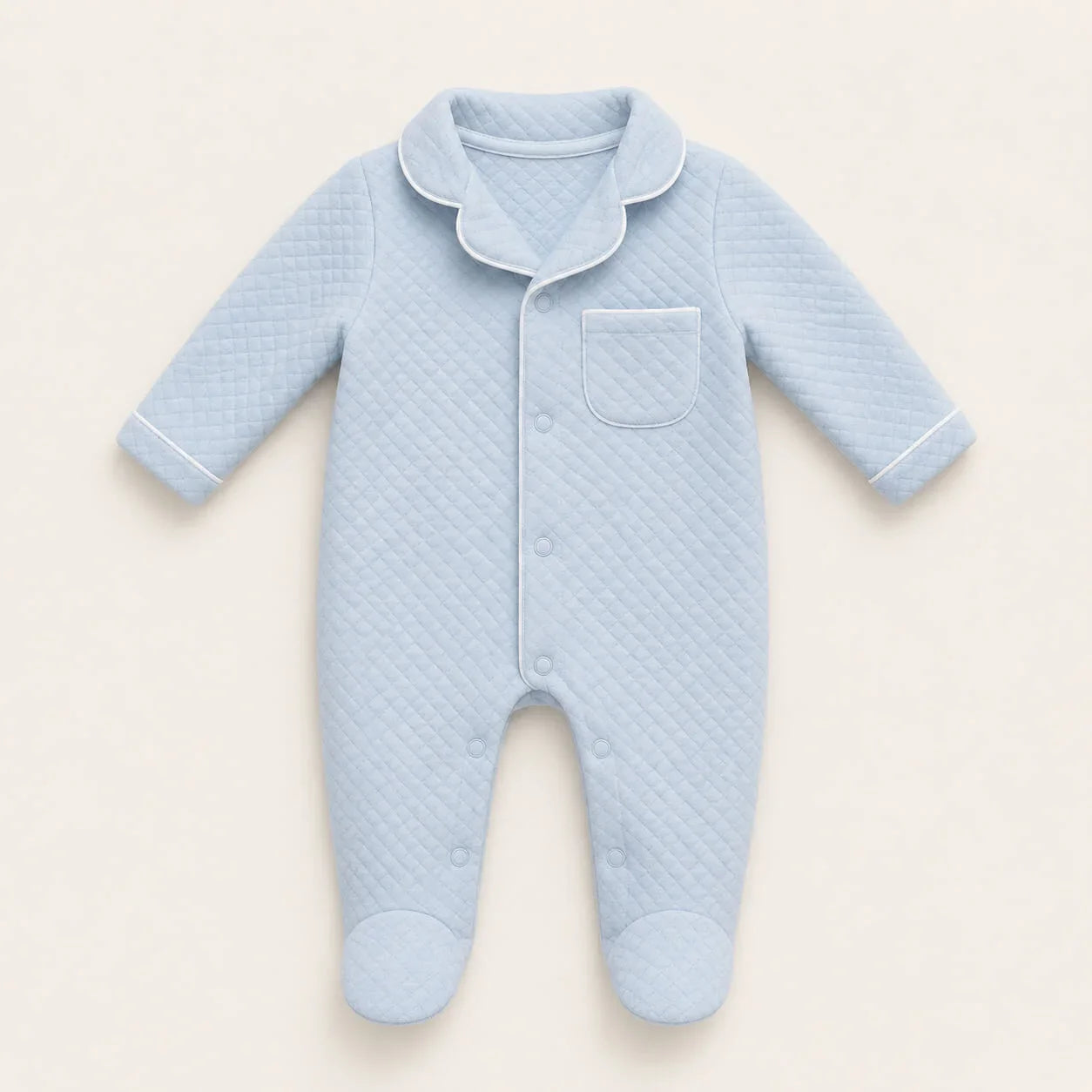 Babygrow para menino em malha algodão azul e abrir à frente e nas duas pernas.