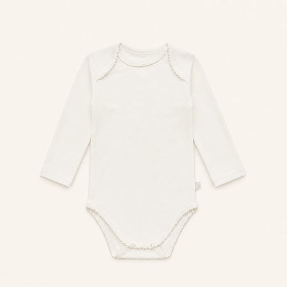 ​Body cava americana para bebé em 100% algodão Interlock bege. Sem etiquetas no decote, anti-pilling e ultra resistente