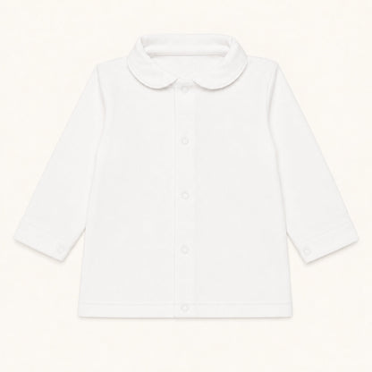 camisola com gola redonda em malha algodão branco, ideal para bebés de 12 meses aos 48 meses. Sem etiquetas irritantes no decote e abrir de cima a baixo para facilitar a muda da roupa