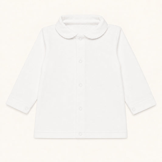 camisola com gola redonda em malha algodão branco, ideal para bebés de 12 meses aos 48 meses. Sem etiquetas irritantes no decote e abrir de cima a baixo para facilitar a muda da roupa