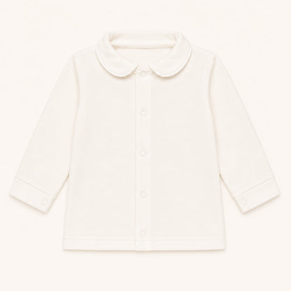 camisola com gola redonda em malha algodão bege, ideal para bebés de 12 meses aos 48 meses. Sem etiquetas irritantes no decote e abrir de cima a baixo para facilitar a muda da roupa