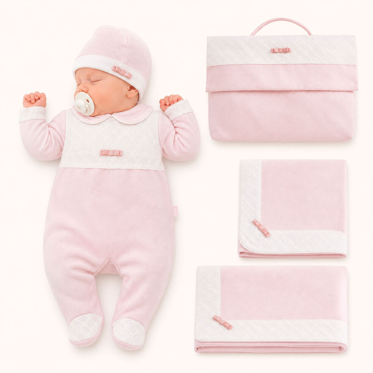 Conjunto de primeira roupa de bebé rosa claro com detalhes em branco e laços, enxoval para recém-nascido.
