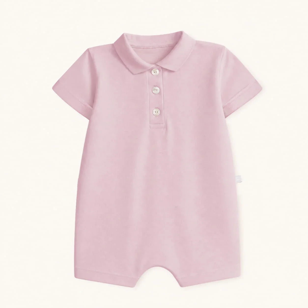 macacão de bebê rosa em algodão piquet com gola polo e botões, roupa confortável infantil