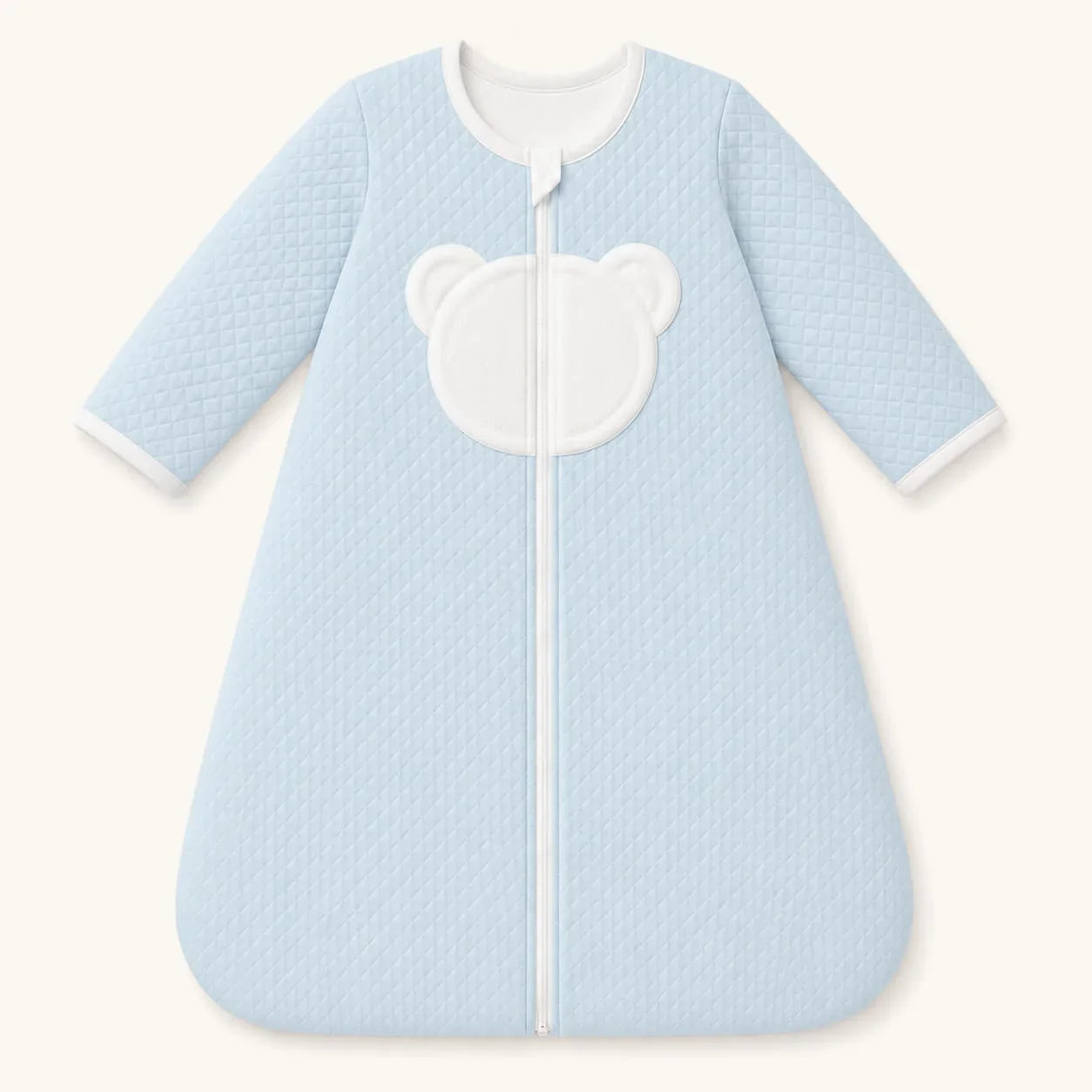 Saco de dormir com TOG 2 com mangas azul para bebé , em malha losango azul e forrado a malha macia interlock branco com cara de ursinho no peito.