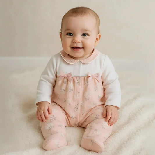 recém-nascido vestido com babygrow em algodão 