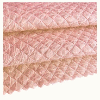 Manta e cobertor rosa velho com textura de losangos em malha macia para bebé