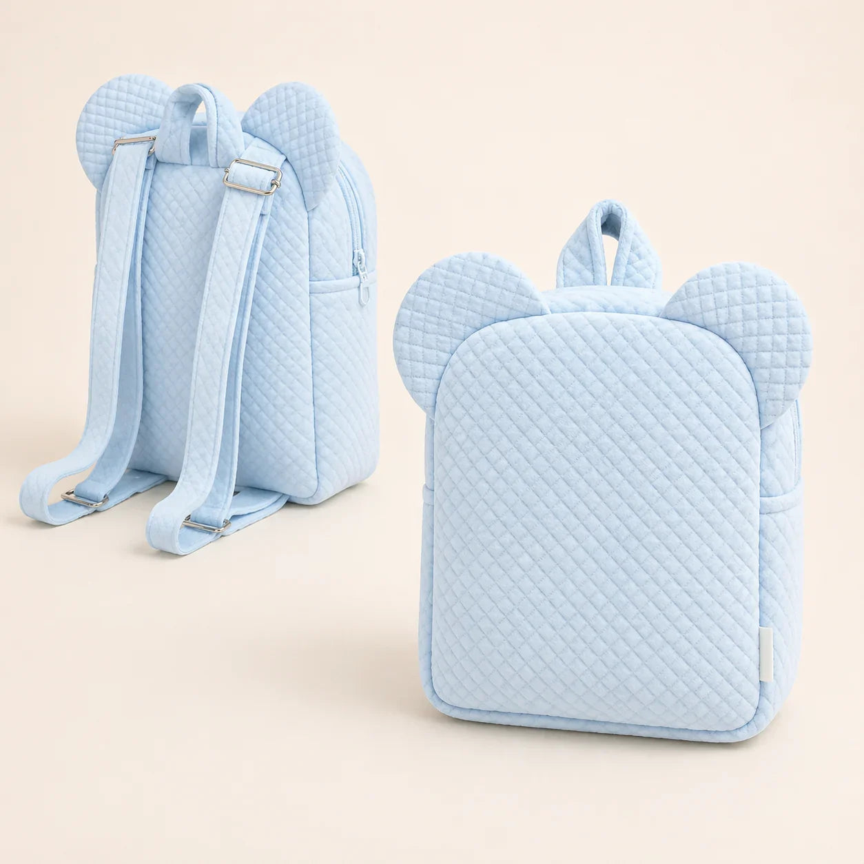 Mochila infantil azul acolchoada com orelhas, ideal para bebé e criança, vista frontal e traseira