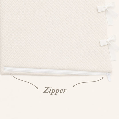 Capa de berço acolchoada com zíper e laços, ideal para recém-nascidos