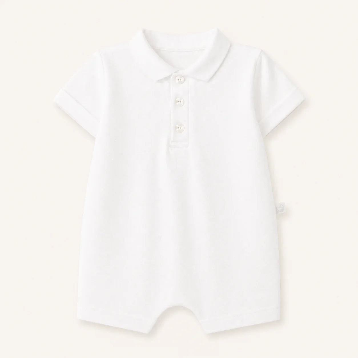 babygrow branco de algodão com gola polo e botões, roupa de bebé confortável