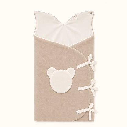 saco nascimento diamante camel com capuz aberto, recomendado para bebé dormir no berço.